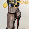 Chaussure à talon avec collier en chaîne dorée Chaussure aquarelle format A4 représentant un pied avec collier en chaîne dorée.
